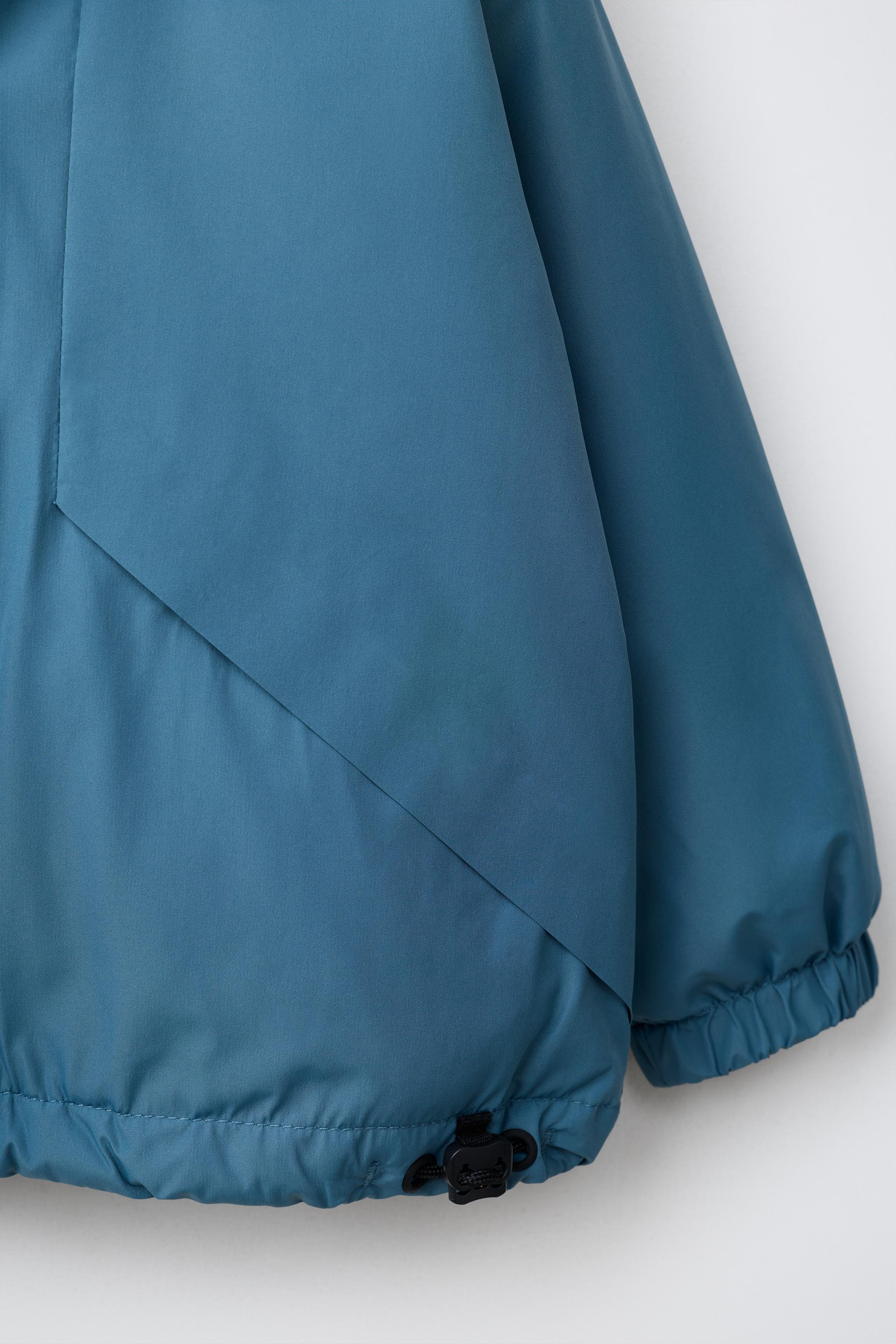 TECHNICAL WATER REPELLENT RAINCOAT